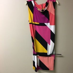 Geometric shift dress with belt .